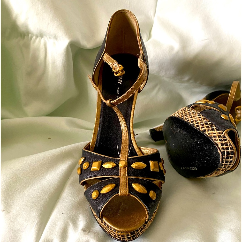 These are not for the faint of heart. Beautiful DKNY made in Italy platforms.